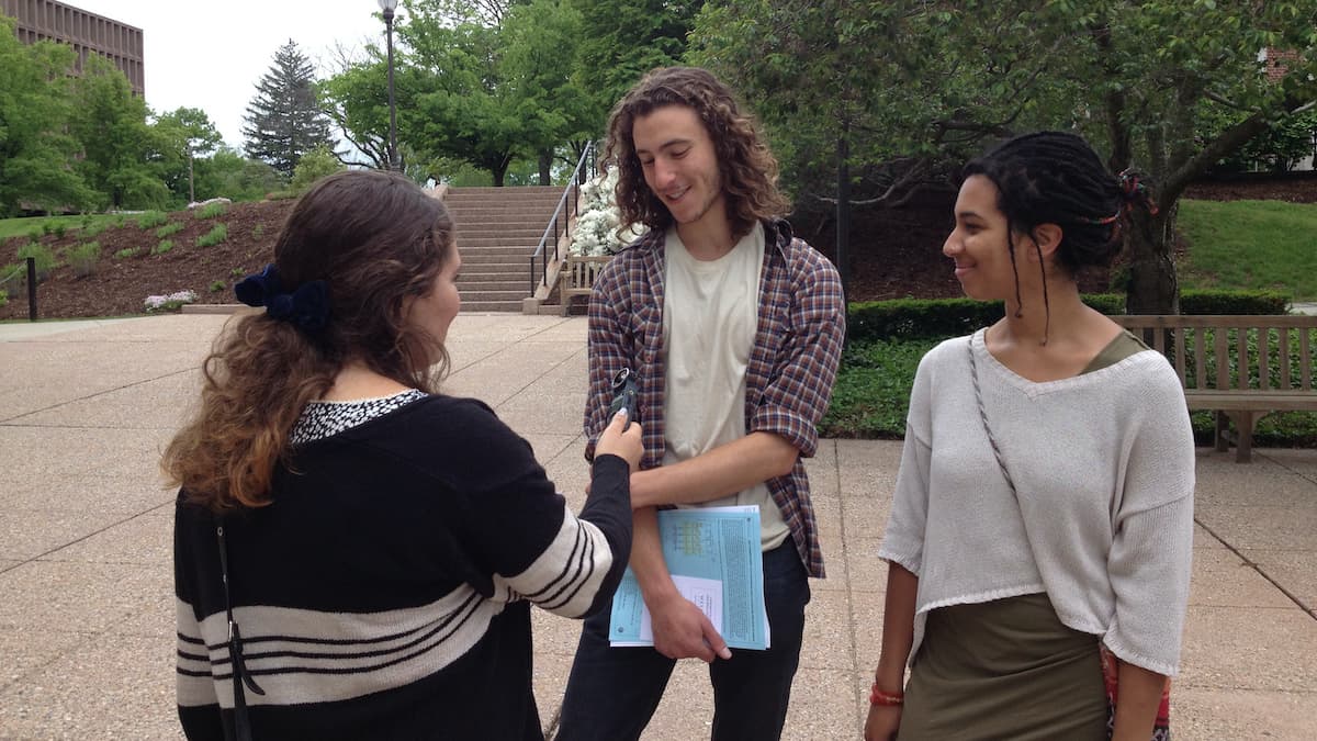 Tess speaks with alumni outside the Allbritton Center.